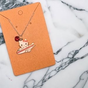 Sanrio Hello Kitty Travel the World Plane Pendant and Charm Necklace